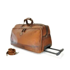 Brązowa skórzana torba na kółkach. Duża