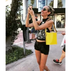 Skórzana torebka damska na rączce z łańcuszkiem "Secchiello" R335