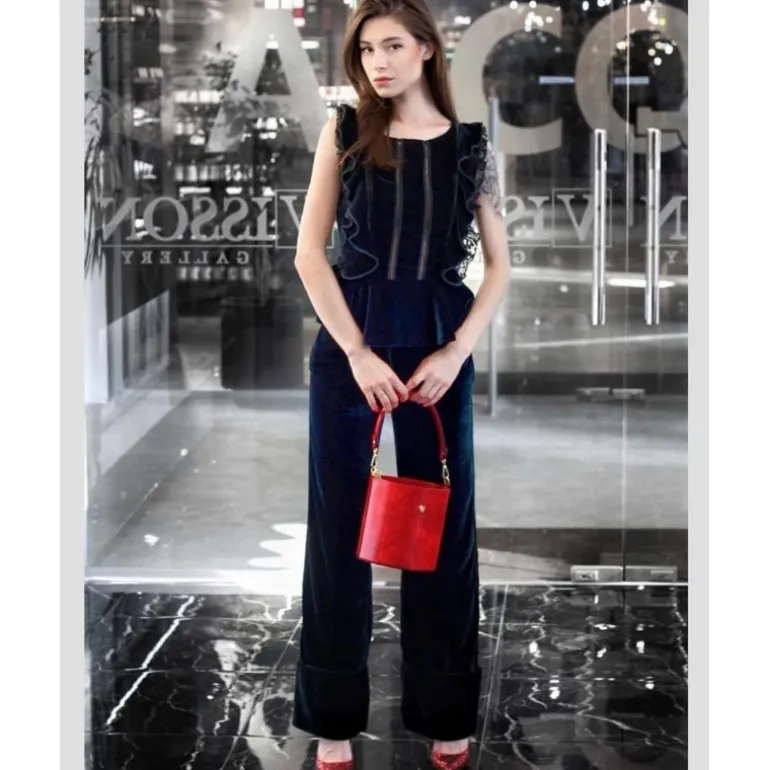 Skórzana torebka damska na rączce z łańcuszkiem "Secchiello" R335