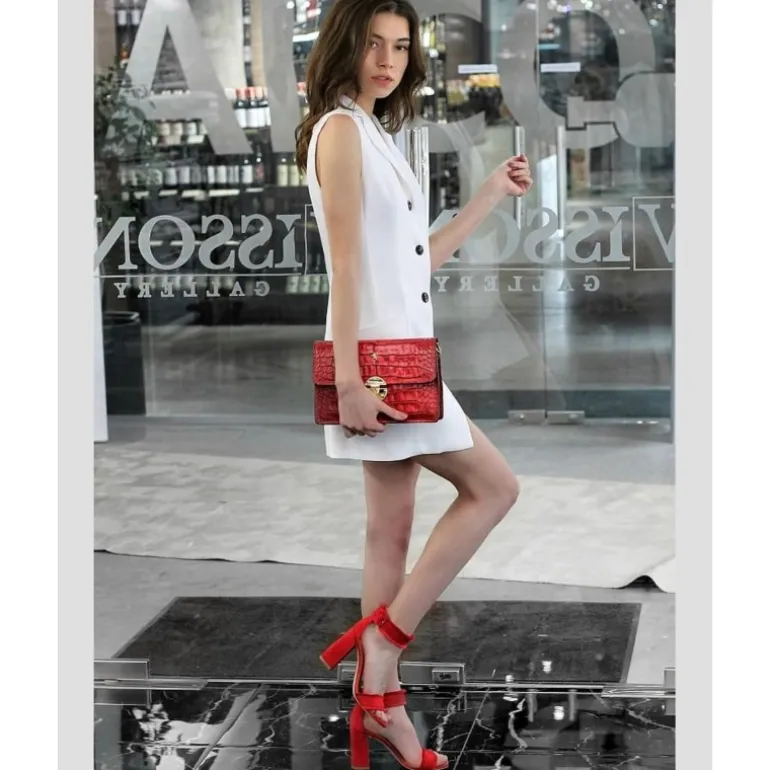 Wieczorowa kopertówka damska ze skóry z łańcuszkiem "Lucrezia de' Medici"